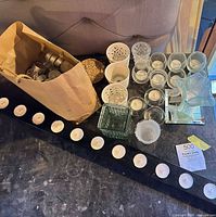 Overview of all candle holders, votive bar, bag of tealights