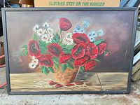 Front view of framed floral painting showing composition and colors