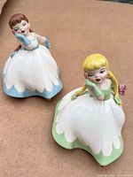Both Holland Mold flower-girl figurines front view