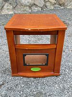 Front view of cube cabinet showing open front, framed cut-out and Kyoto sticker