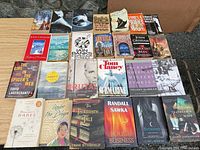 Overall view showing first 21 books laid out in rows