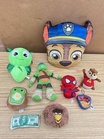 All nine plush toys laid out for overview