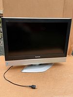 Front view of Panasonic TC-32LX50 LCD TV on swivel stand