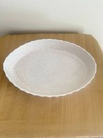 Top view of oval speckled dish