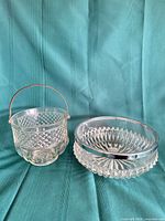 Front view of both cut glass pieces together