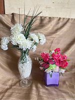 Both flower arrangements side by side