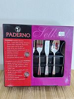 Front of sealed Paderno Selkirk flatware box showing utensils and branding