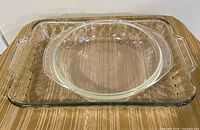 Top view of round bowl nested inside rectangular dish showing overall shapes and clarity