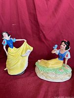 Both Snow White figurines front view