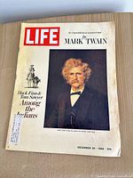 Front cover showing title, Mark Twain portrait, price and date