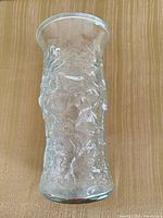 Side view of clear crinkled glass vase showing texture and form