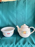 Teapot and bowl front view together
