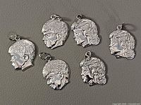 All six sterling silver profile charms