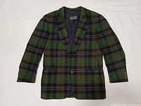 Front view of green and navy plaid wool sport coat