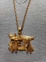 Front view of pendant on display bust