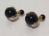 Front view showing double-bead design and Dior engraving