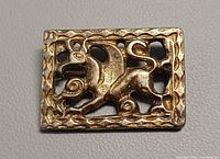 Front view of brooch showing full Pegasus design and border