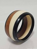 Angled view showing exterior stripe pattern and thickness