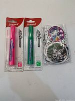 Front view of two Monami blister-pack highlighters and sealed space sticker pack