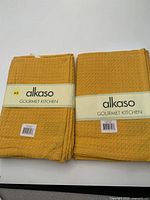 Front view of two factory-sealed twin packs showing Alkaso branding and color