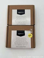 Front view showing two sealed boxes with AmazonBasics labels