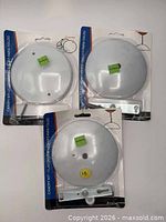 Front view of three sealed Atron LA606 canopy kits