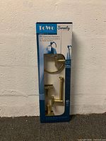 Front of boxed Toolway Serenity 3-piece brushed gold bathroom hardware set