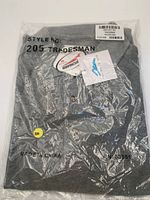 Gray Style 205 Tradesman polo sealed in bag with tags visible