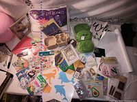 Overview of assorted craft materials on table