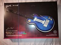 Full retail box showing Gibson Les Paul Blueberry Burst Pro Edition wireless guitar controller