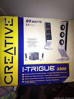Front of sealed box showing Creative branding and model