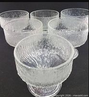 Front angled view showing five of the textured glass cups
