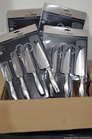 Four boxed Prime Chef knife sets inside carton