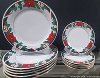 Stack of dinner and side plates showing front pattern