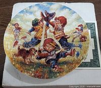 Front of plate showing baseball scene