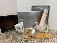 Group shot of all bakeware, appliances and accessories on countertop