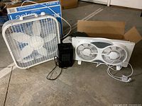 Group shot of all three appliances: Lasko box fan, PTC heater, Comfort Zone window fan