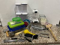 Group shot of all food containers and utensils on countertop