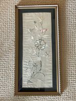 Full view of framed silk embroidery showing design and frame
