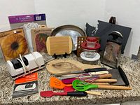 All items in lot displayed together on countertop