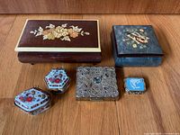 Overall view of six items on wood surface