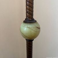 Close-up of uranium glass ball on lamp post