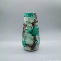 Front view of mottled glass vase