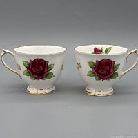Front view of both Royal Albert Picardy Rose tea cups