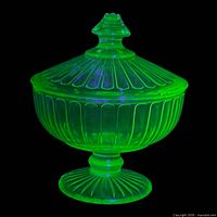 Compote glowing under UV showing uranium fluorescence