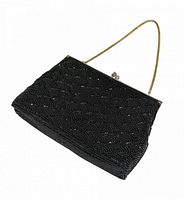 Front view of black beaded clutch showing scallop beadwork, frame and chain