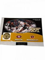 Front view of commemorative card showing full design and medallion