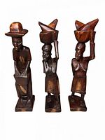 Front view of all three wooden figures