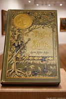 Front cover showing decorative binding and gilt portrait medallion