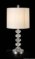 Full view of crystal table lamp with shade